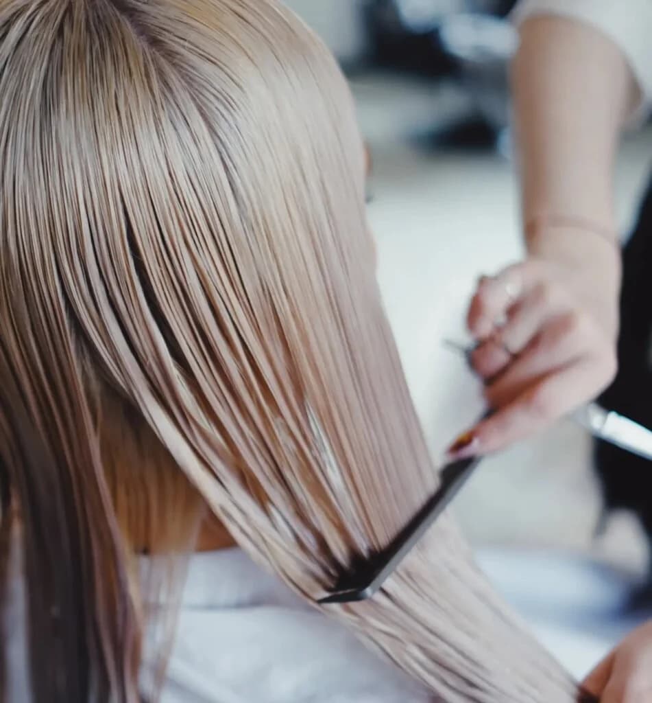 Stylist working on hair